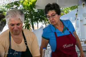 Two Greek woman in a kitchen courtyard, Platia, Naxos Greece