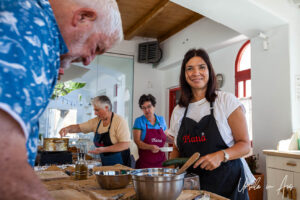 Cooks at work in a kitchen, Platia cooking school, Naxos Greece