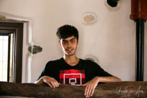 Portrait: young Greek man, Eggares Olive Oil Museum, Naxos.
