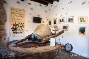 Old olive press and other tools, Eggares Olive Oil Museum, Naxos Greece.