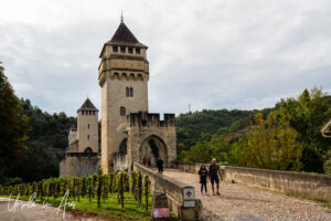 Pedestrians on the Pont Valentré, Cahors France