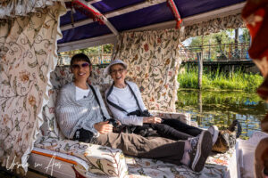 Two women in a shikara, Dal Lake, Jammu and Kashmir, India