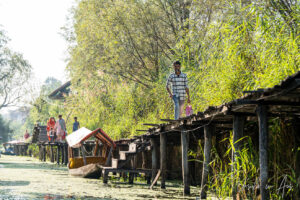 Man walking on a walkway, Dal Lake, Jammu and Kashmir, India