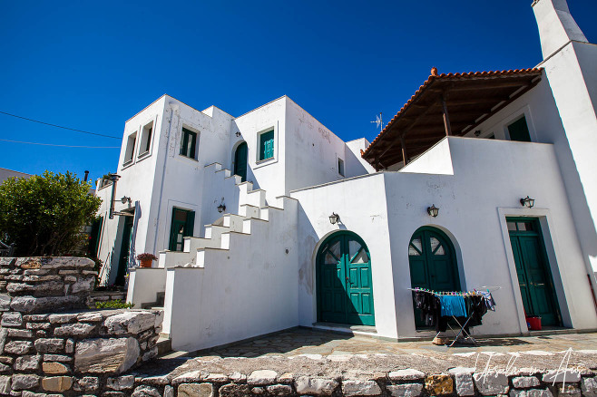 Rambling whitewashed house on a mountainside, Apeiranthos, Naxos, Greece