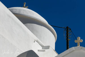 White Orthodox dome on a blue sky, Apeiranthos, Naxos, Greece