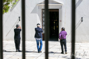 Three people with bell pulls, Church of Panagia Aperathitissa, Apeiranthos, Naxos, Greece