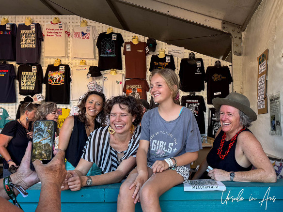 Hussy Hicks with a young fan in the Byron Bay Bluesfest merchandise tent, Australia