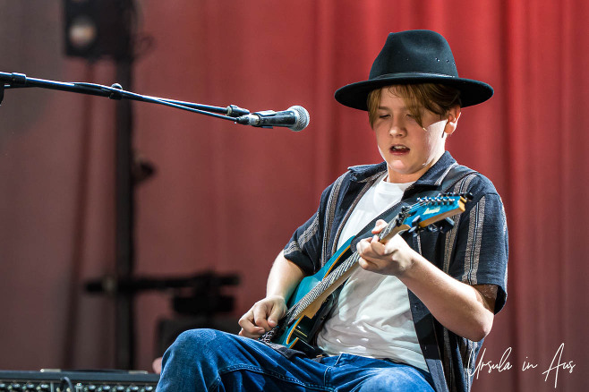 Young Torin Peat on guitar, Jambalaya stage, Byron Bay Bluesfest, Australia