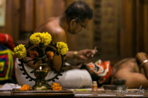 A burning candle in a dancing Shiva frame, Kerala Kathakali Centre, Fort Kochi, India