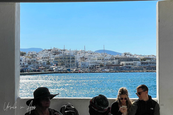 Silhouetted passengers in the Naxos ferry terminal, Greece.