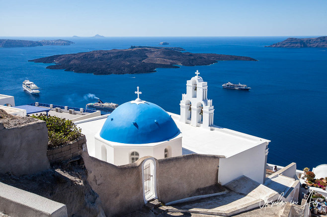 Looking over the dome and Three Bells of Fira towards the sea, Santorini, Greece