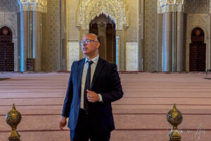 A guide, Mosque of Hassan II, Casablanca Morocco