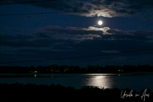 Full moon rising over the Lake Curalo, Eden NSW Australia