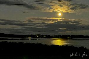 Full moon rising over the Lake Curalo, Eden NSW Australia