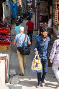 Pedestrians in the narrow streets of Srinagar, Jammu and Kashmir, India.