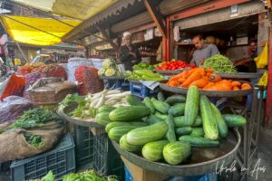Man in a fresh vegetable stall, Srinagar Nowhatta, Jammu and Kashmir, India.