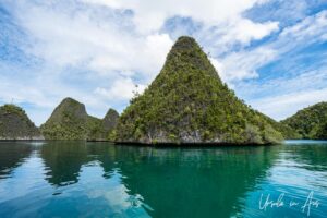 Tropical jungle on small conical islands, Pulau Wayag, Southwest Papua Indonesia