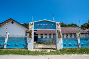 YPK Bethel Doom Junior High School from outside the gate, Southwest Papua, Indonesia.