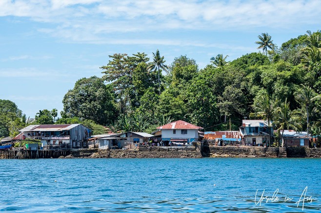 Houses on the shoreline of Pulau Doom, Southwest Papua, Indonesia.