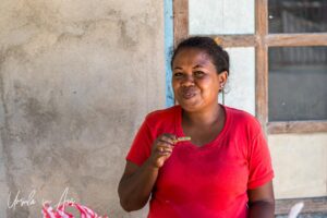 Environmental portrait: smiling woman, Doom, Southwest Papua, Indonesia.