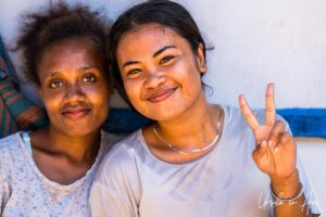 Environmental portrait: two young women, Doom, Southwest Papua, Indonesia.