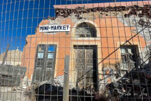 Old Oia mini market behind a fence, Santorini Greece