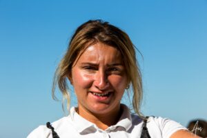 Environmental portrait: Serving woman at Venetsanos Winery, Santorini Greece