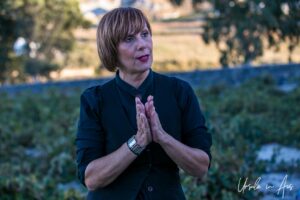 Environmental portrait: woman at Estate Argyros, Santorini Greece