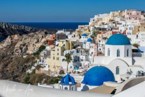 View over the blue domes of Oia, Santorini Greece.
