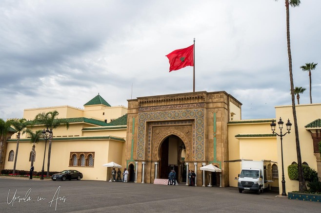 Moroccan flag flying over the entry to the Royal Palace in Rabat.