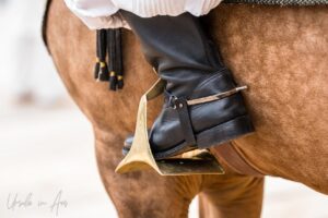 Boot and stirrup of a horse guard outside the Mausoleum of Mohammed V, Rabat Morocco.