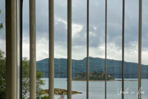Views over Skidegate Channel though vertical blinds, Daajing Giids Haida Gwaii BC Canada