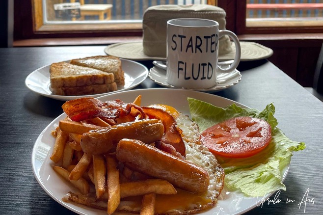 Bacon, sausages, eggs and chips with toast and coffee on the side, Daajing Giids Haida Gwaii BC Canada
