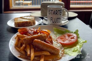 Bacon, sausages, eggs and chips with toast and coffee on the side, Daajing Giids Haida Gwaii BC Canada