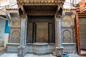 Tiled public fountain, Meknes medina, Morocco.