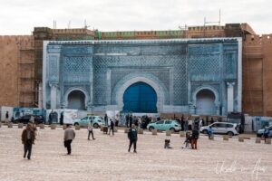 The Mansour Gate behind a blue screen, Meknes, Morocco