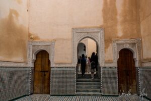 Stairs and arched doorways inside the Mausoleum of Moulay Ismail, Meknes, Morocco