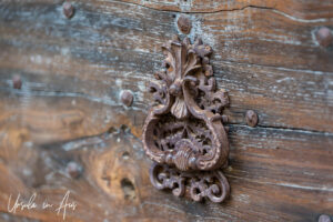 Detail: decorative metal door knocker, Saint-Cirq Lapopie, France