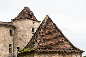 Pointed roofs on narrow square towers, Musée Rignault, Saint-Cirq Lapopie, France