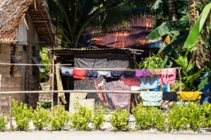Clothes dying on bamboo poles, Pulau Soop Indonesia