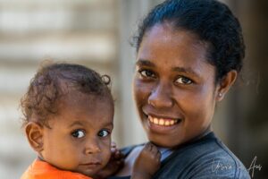 Portrait: A woman and her young child, Pulau Soop Indonesia