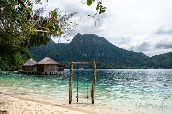 Beach huts and mountains, Pulau Seram, Maluku Indonesia