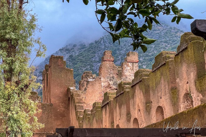Mountains and cloud behind the walls of Chefchaouen Kasbah, Morocco.
