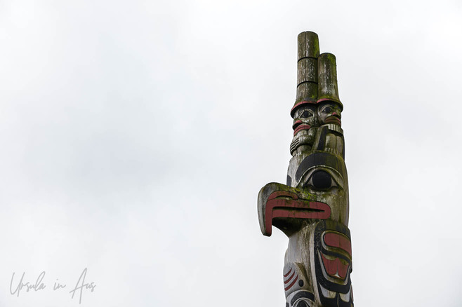 Top of the Born Together Clan Pole against the sky, Skidegate, Haida Gwaii Canada