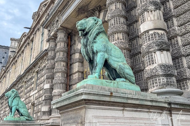 Lions at the Lions Gate, the Louvre, Paris France