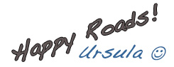 Text: Happy Roads!