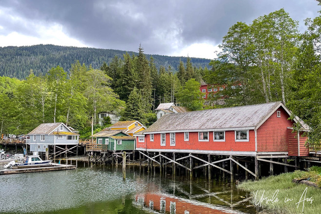 View over wooden buildings on poles over the water, in Telegraph Cove, BC, Canada