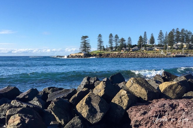 Looking across Black Beach Cove to Blowhole Point, Kiama NSW Australia.