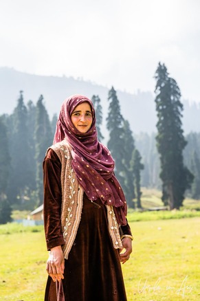 Outdoor portrait of a young Gujar woman in a head covering, Doodhpathri, Budgam India.