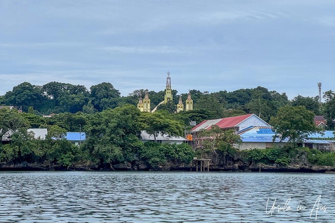 Yellow church near the waterfront, Saumlaki, Pulau Yamdena, Indonesia.